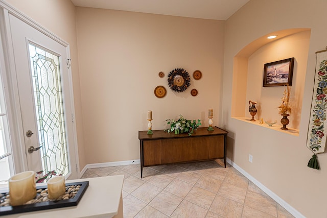 view of tiled foyer entrance