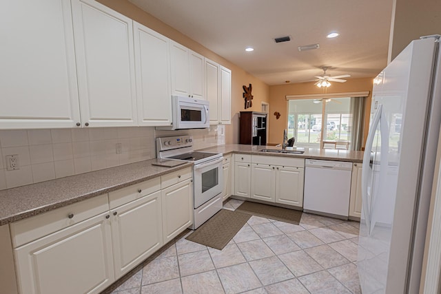 kitchen featuring sink, white appliances, ceiling fan, white cabinetry, and decorative backsplash