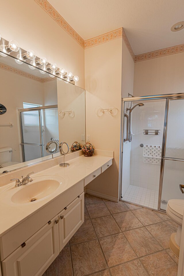 office space with sink, light tile patterned floors, and ceiling fan