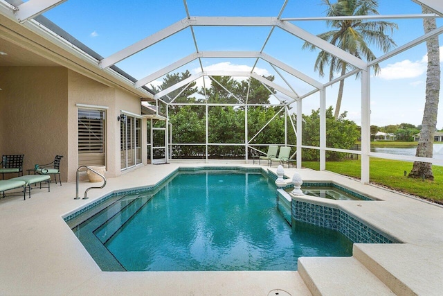 view of pool featuring glass enclosure, an in ground hot tub, and a patio