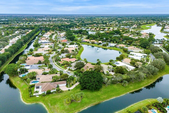 bird's eye view with a water view