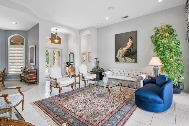 tiled living room with french doors