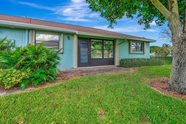 exterior space with a lawn