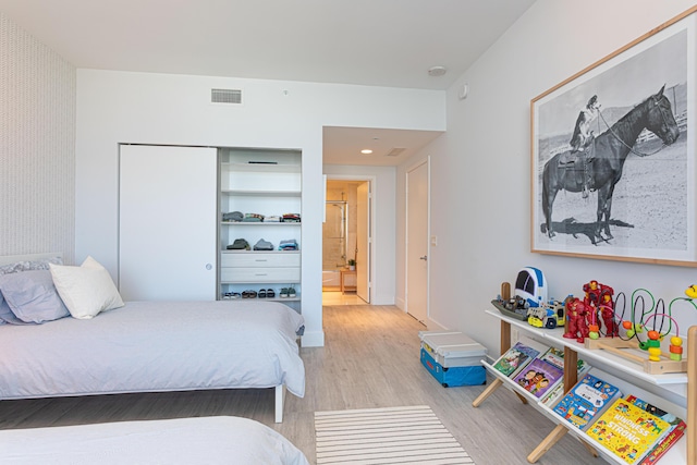 bedroom featuring light hardwood / wood-style floors