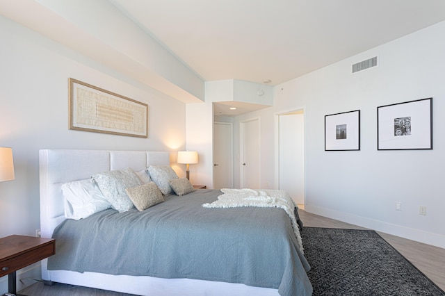 bedroom featuring hardwood / wood-style flooring