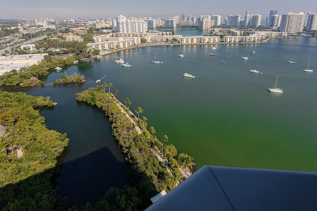 birds eye view of property featuring a water view