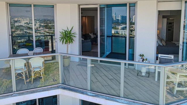 doorway to property featuring a balcony