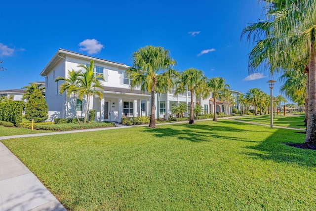 view of front of home with a front yard