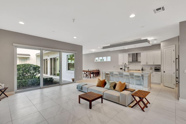 living room featuring sink