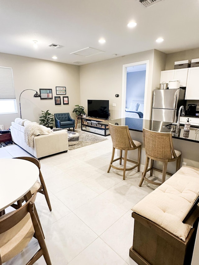 tiled living room with sink