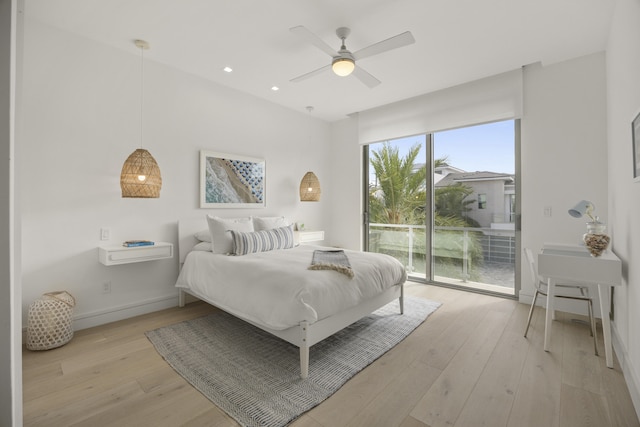 bedroom featuring ceiling fan, access to outside, and light wood-type flooring