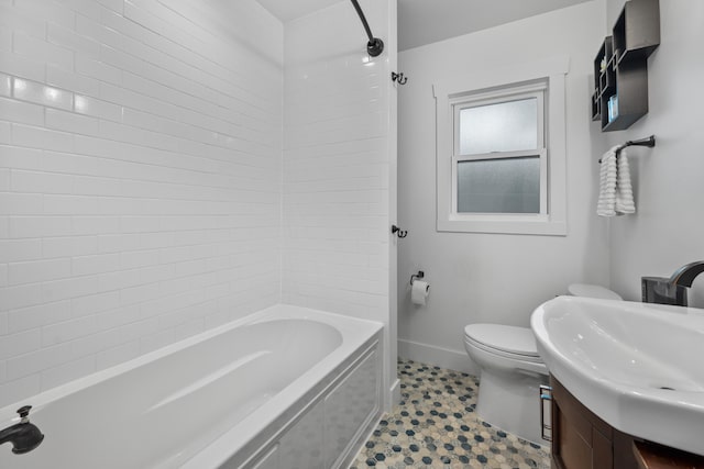 full bathroom featuring toilet, vanity, and shower / bathing tub combination