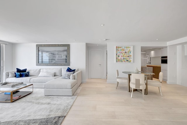 living room with light hardwood / wood-style floors