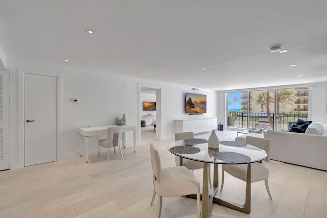 3456 S Ocean Blvd Unit 2060, Palm Beach, FL 33480 - dining room with recessed lighting and light wood-style flooring