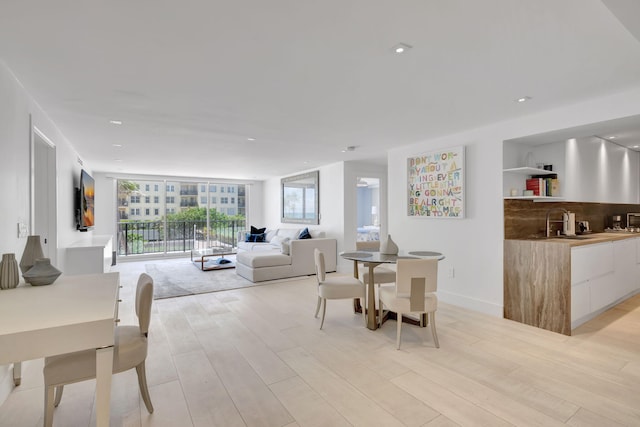 3456 S Ocean Blvd Unit 2060, Palm Beach, FL 33480 - dining room featuring light wood finished floors