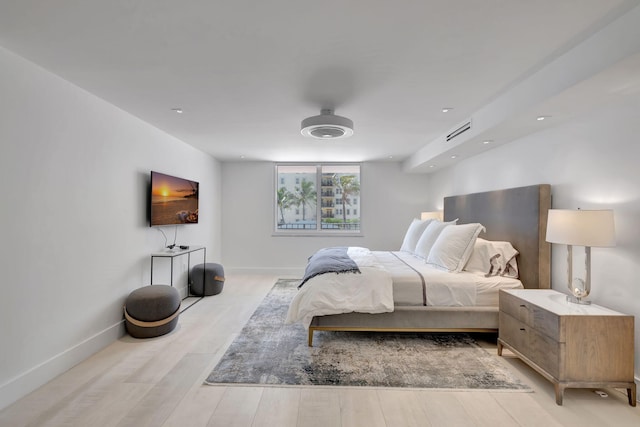 bedroom with light hardwood / wood-style floors