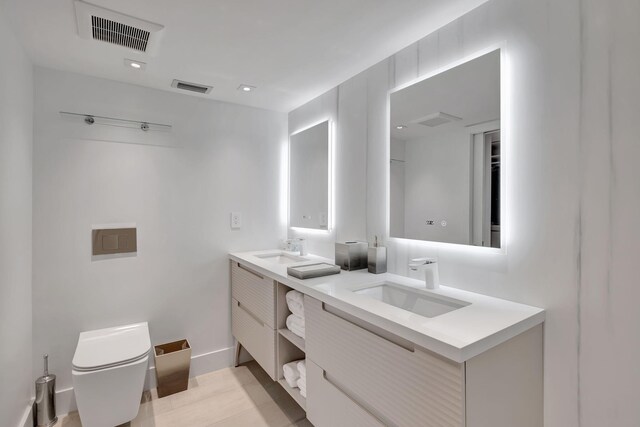 walk in closet featuring light tile patterned floors