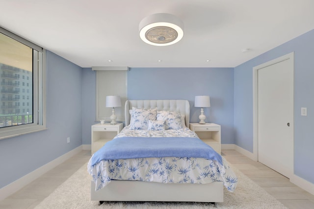 bedroom with light hardwood / wood-style floors