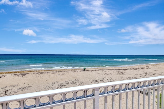 property view of water featuring a beach view