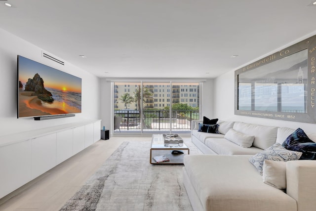 3456 S Ocean Blvd Unit 2060, Palm Beach, FL 33480 - living area with floor to ceiling windows and light wood-style floors