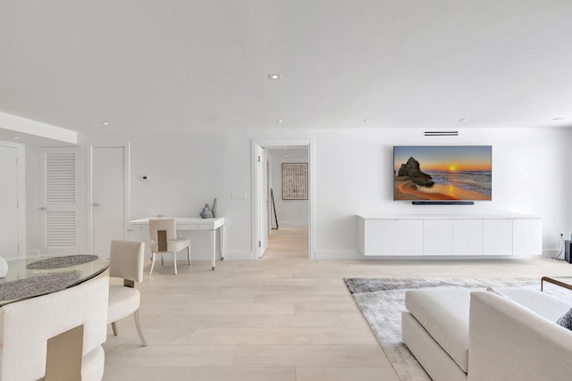 3456 S Ocean Blvd Unit 2060, Palm Beach, FL 33480 - living area featuring light wood-style flooring and baseboards