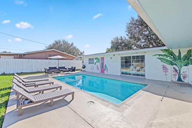 view of swimming pool with a patio area and outdoor lounge area