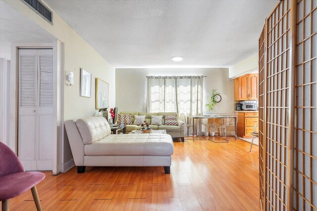 living room featuring light hardwood / wood-style floors