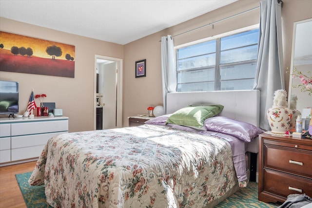 714 NE 10th St Unit 205, Hallandale Beach, FL 33009 - bedroom featuring wood finished floors