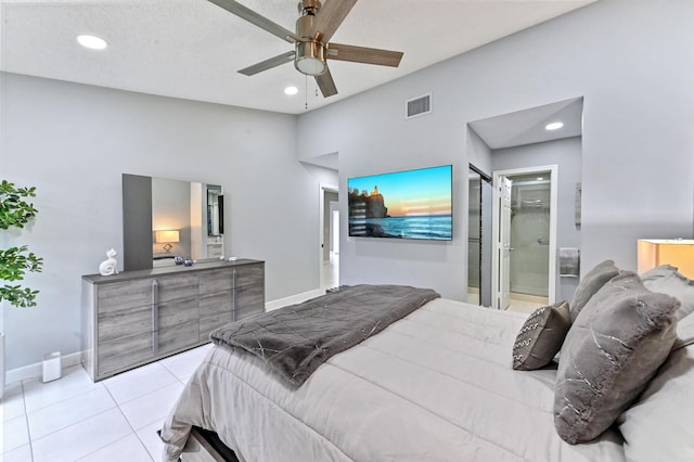 5650 Parkwalk Cir E, Boynton Beach, FL 33472 - tiled bedroom featuring ensuite bathroom, visible vents, baseboards, recessed lighting, and a ceiling fan