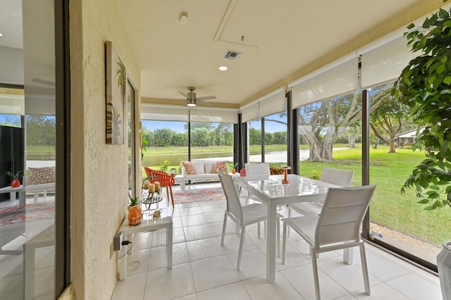 5650 Parkwalk Cir E, Boynton Beach, FL 33472 - sunroom with an outdoor hangout area, outdoor dining area, visible vents, and a ceiling fan