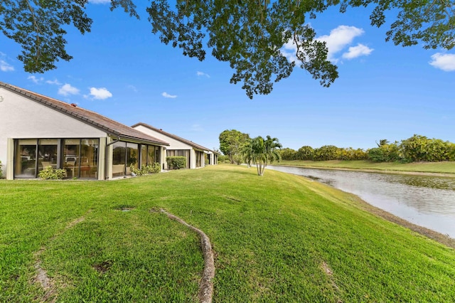 5650 Parkwalk Cir E, Boynton Beach, FL 33472 - view of yard with a water view and a sunroom