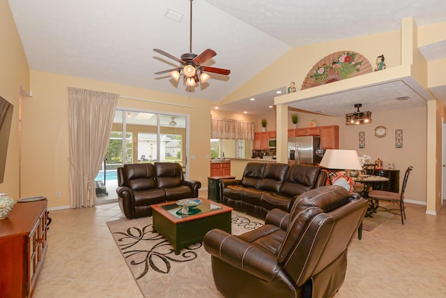 tiled living room with vaulted ceiling and ceiling fan with notable chandelier