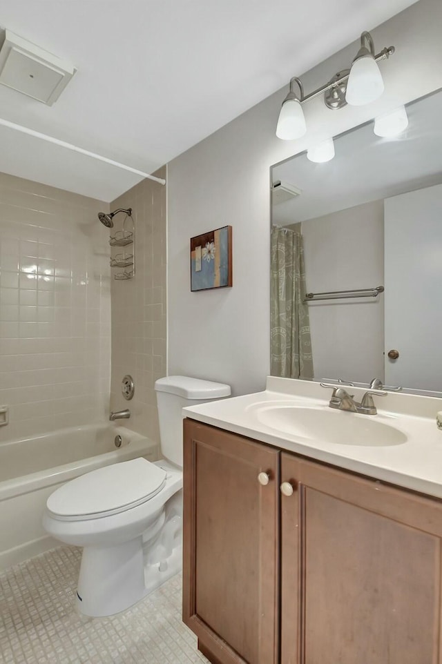 full bathroom featuring toilet, vanity, and shower / bath combo