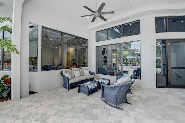 view of patio / terrace with ceiling fan and an outdoor hangout area