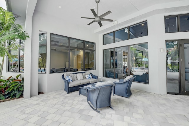 view of patio / terrace with ceiling fan and an outdoor hangout area