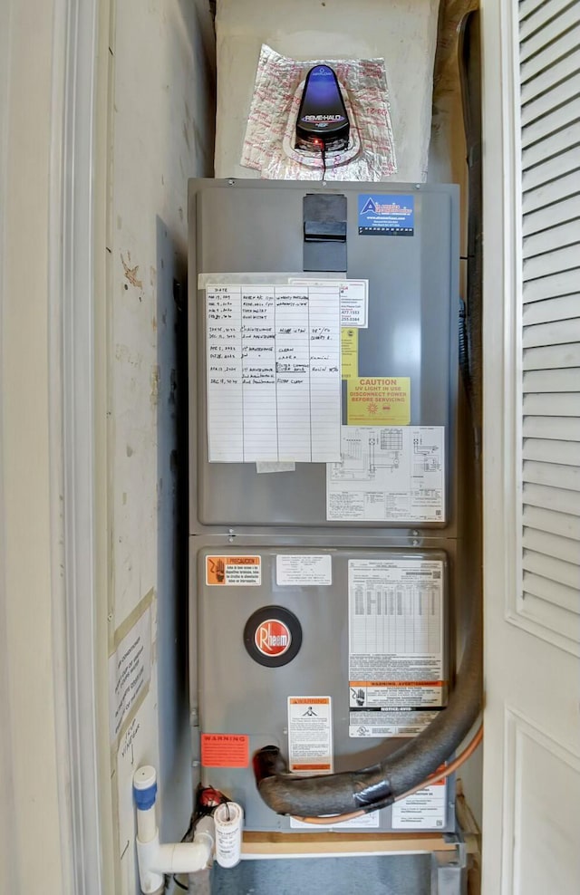 utility room with heating unit