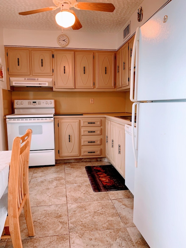 kitchen featuring ceiling fan, white appliances, a textured ceiling, and light tile patterned floors