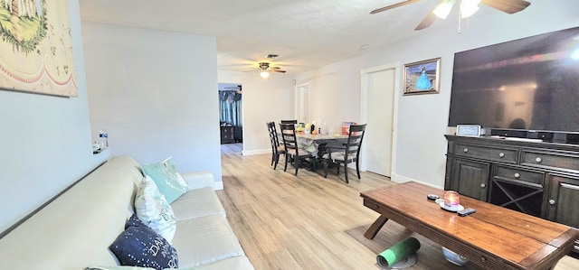 living room with light hardwood / wood-style floors