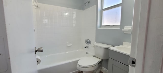 full bathroom featuring vanity, tub / shower combination, and toilet