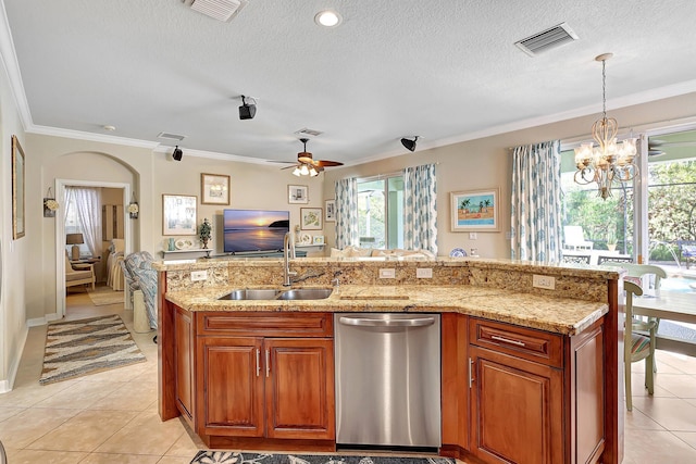 kitchen with a wealth of natural light, visible vents, dishwasher, and a sink