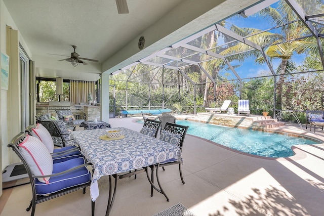 pool featuring a lanai, a ceiling fan, outdoor dining area, and a patio