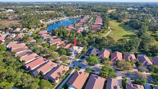 aerial view with a residential view and a water view