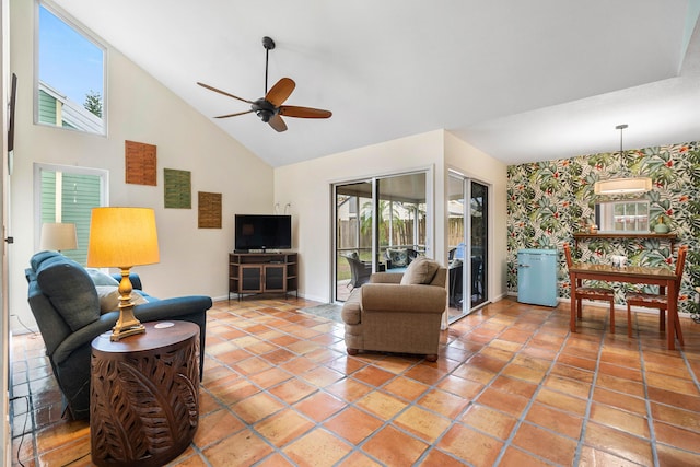 living room featuring high vaulted ceiling, tile patterned floors, and ceiling fan