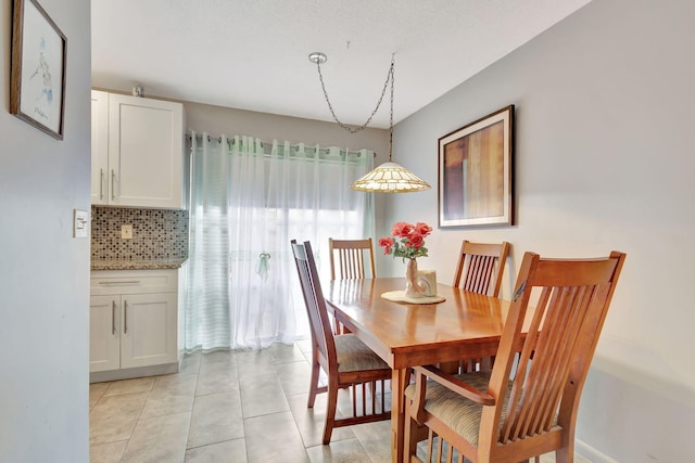 view of tiled dining space