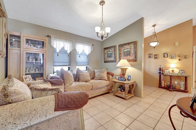 living room with vaulted ceiling, a chandelier, light tile patterned floors, and a textured ceiling