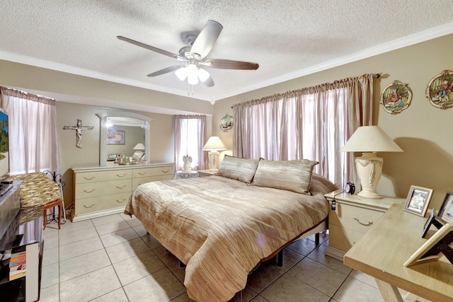 bedroom featuring multiple windows, light tile patterned floors, crown molding, and a textured ceiling