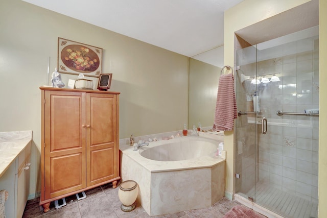 bathroom with vanity, separate shower and tub, and tile patterned floors