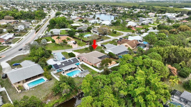 drone / aerial view featuring a water view