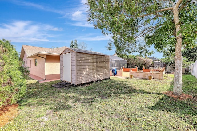 view of yard with a shed