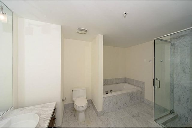 full bathroom with vanity, toilet, and shower with separate bathtub